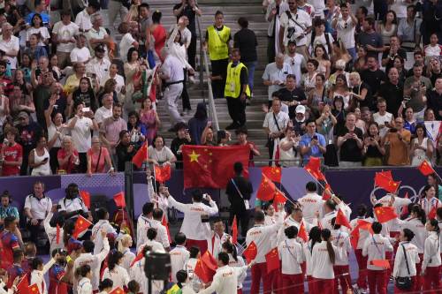 Medaglie, uniformi per gli atleti e tecnologia: le Olimpiadi delle “prime volte” della Cina