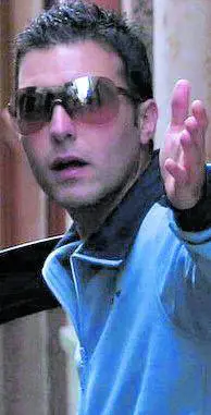 La sfida di Riina jr: "All'asta il ritratto di mio padre"