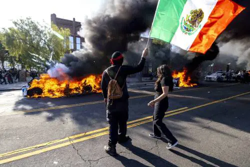 Migranti e rivolte, ira Trump. "Arresterei il governatore"