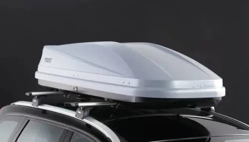 Viaggiare in auto per andare in vacanza, occhio ai bagagli sul tetto: cosa dice il codice della strada