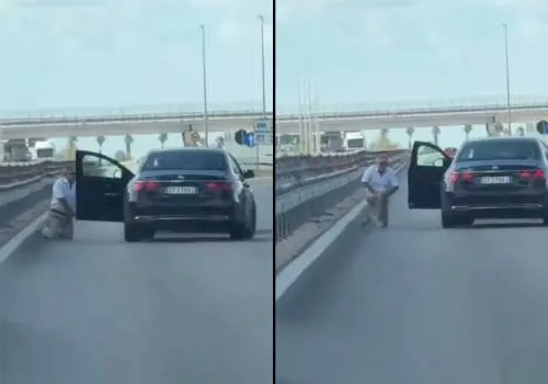 Commando armato blocca auto in strada: uomo rapinato e in ginocchio, le immagini choc