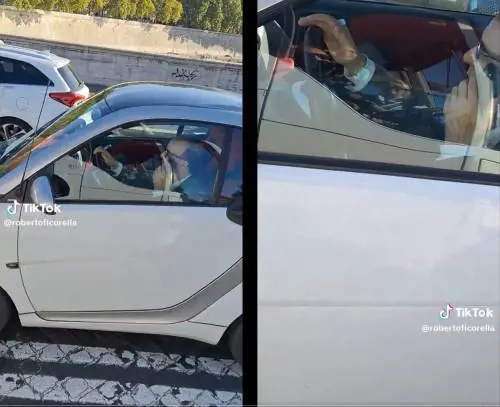 Benigni in auto col cellulare, snobba pure i fan. È polemica
