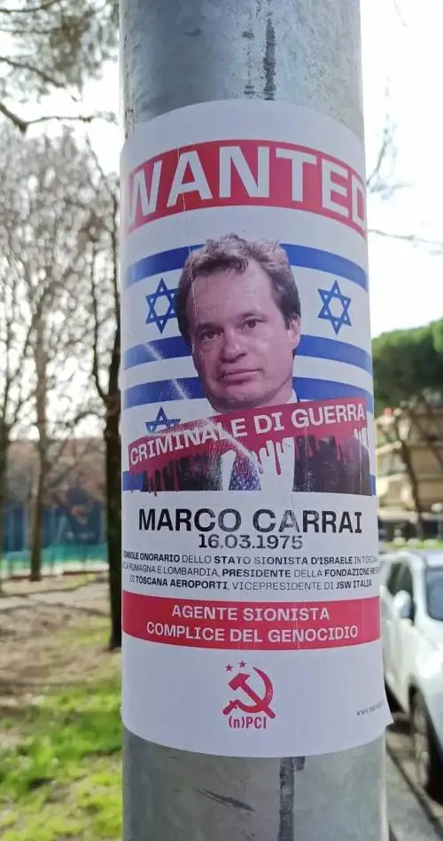 "Criminale di guerra". Il cartello della vergogna contro Carrai nella Giornata della Memoria