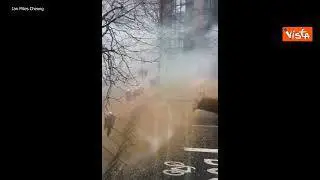 Idranti contro gli agricoltori in protesta a Bruxelles