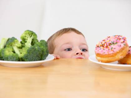 Lo studio scientifico: "Ecco perché i bimbi sorridono"