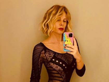 Alessia Marcuzzi, ricami seducenti sui social