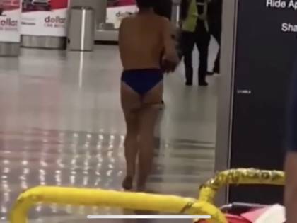 Miami, donna si spoglia in aeroporto e sale nuda sul tettuccio dell'auto della polizia