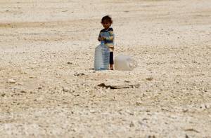 Siria, bambino profugo nel campo di Zaatari, in Giordania