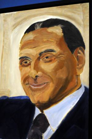 Prima mostra di quadri di G. Bush. C'è anche Berlusconi