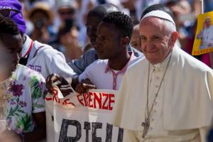 Papa Francesco con gli immigrati in San Pietro