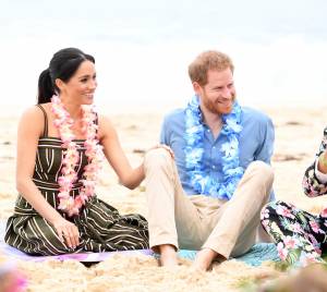 Il Principe Harry e Meghan Markle a una festa in spiaggia