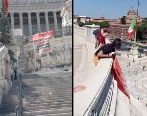 "No al fossile", blitz degli attivisti per il clima all'Altare della Patria