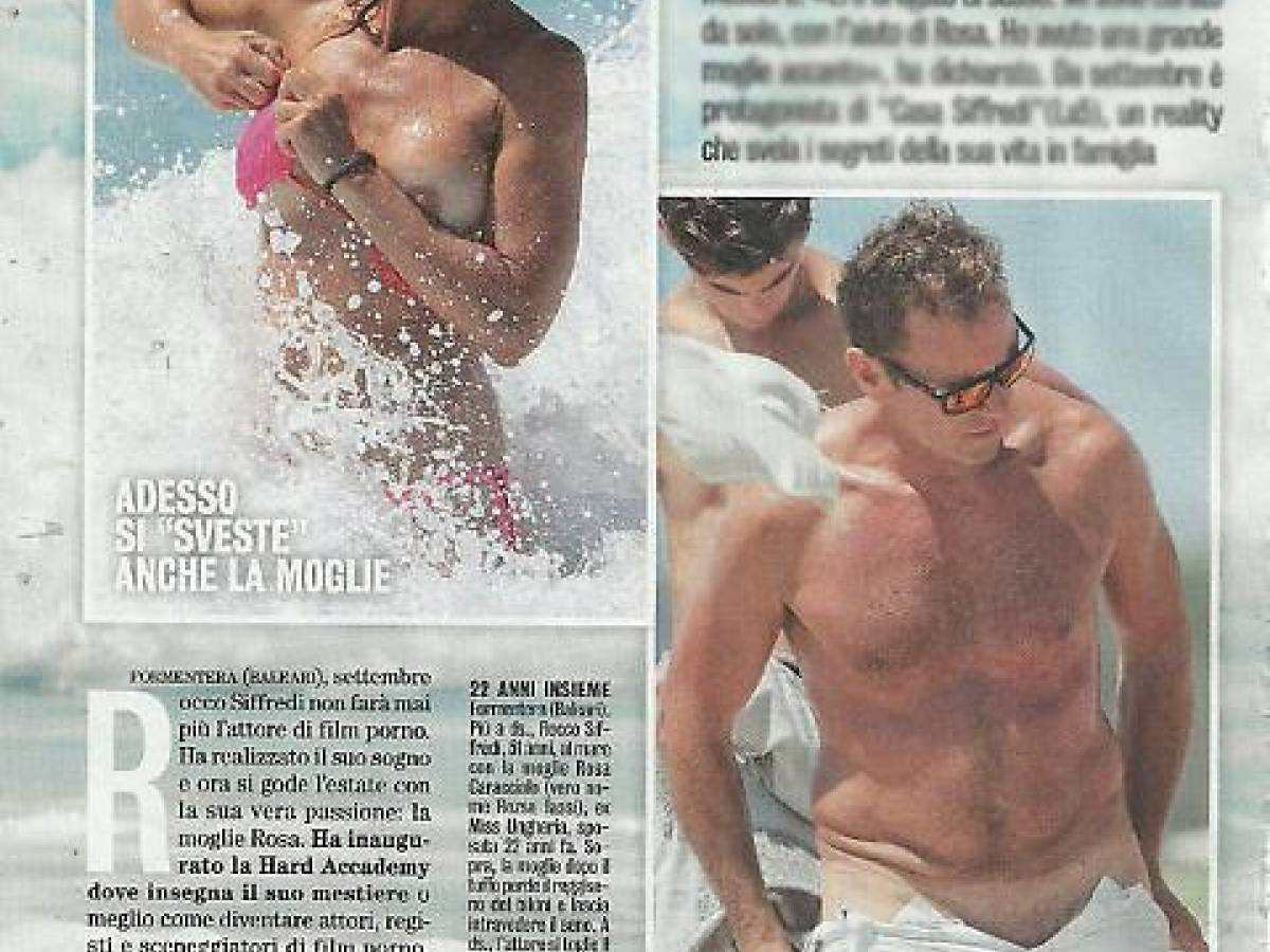 Rocco Siffredi e la moglie al mare lui si spoglia, lei resta in topless