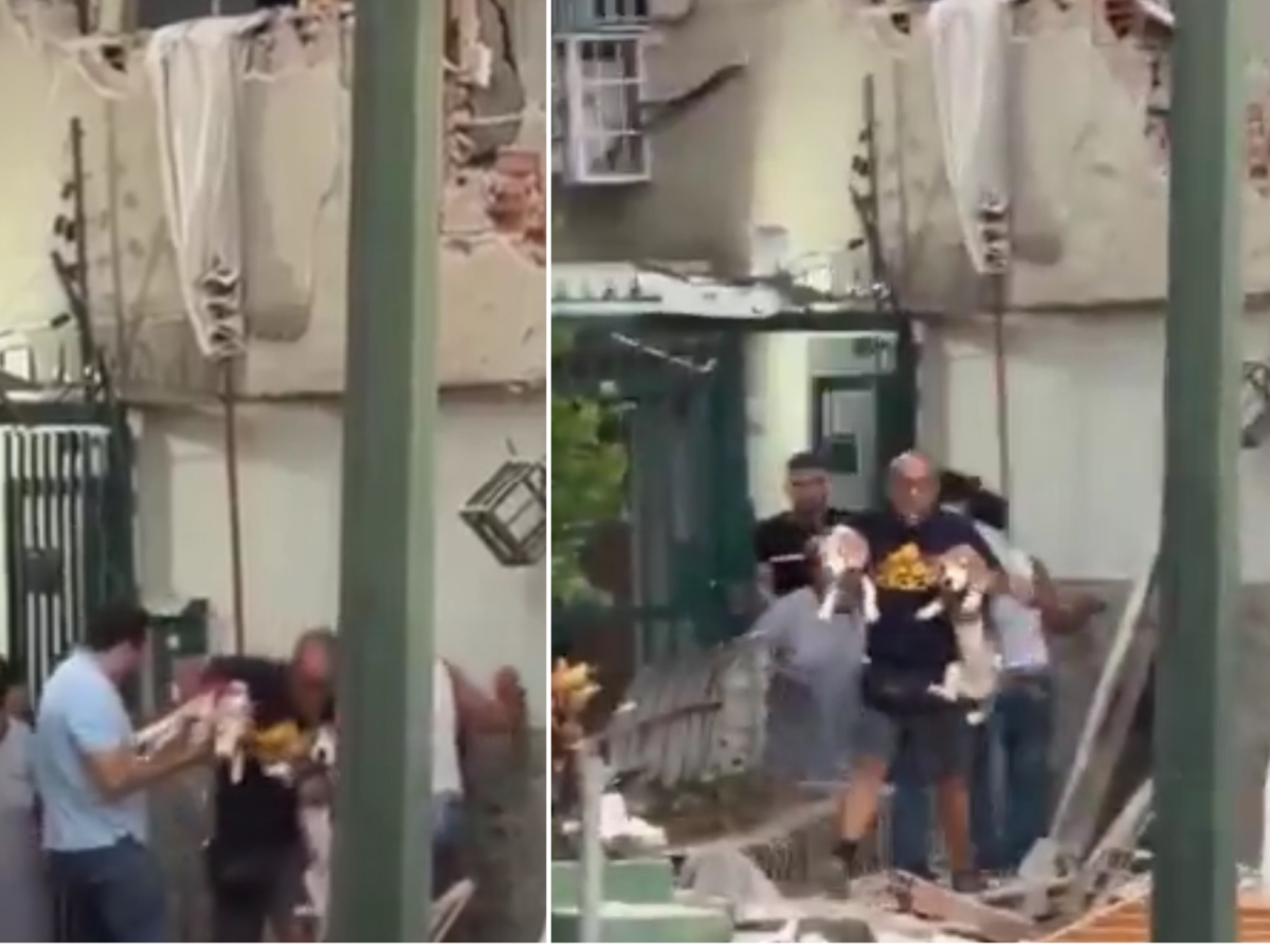caracas uomo scappa dalla casa in macerie con i suoi due cani in braccio durante il sisma da Ilgiornale.it caracas uomo scappa dalla casa in macerie con i suoi due cani in braccio durante il sisma