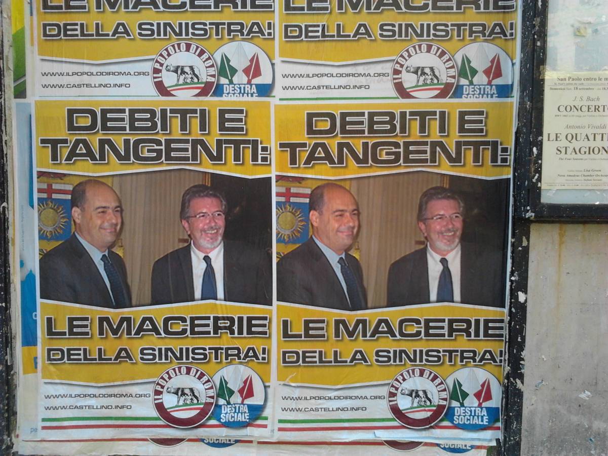 Penati accanto a Zingaretti: “Debiti e tangenti”
 
E a Roma si scatena la guerra dei manifesti