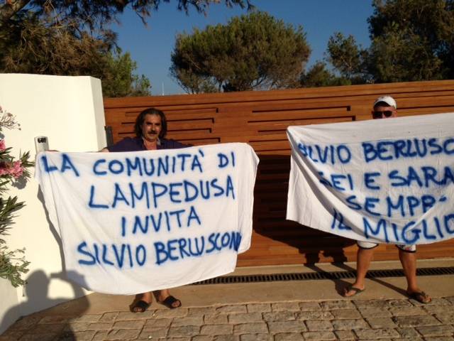 Lampedusa pronta: "Silvio, vieni qui"