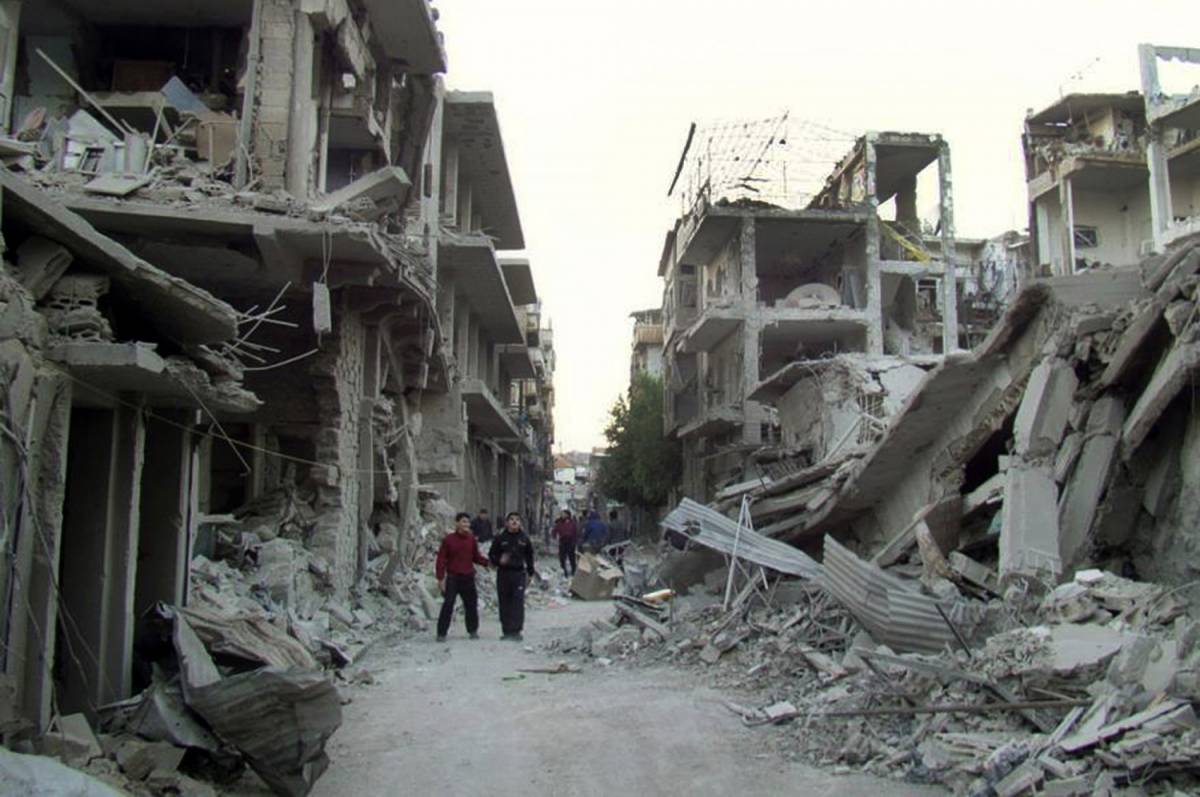 Cittadini siriani tra le rovine di Homs / Archivio, 29.11.2012