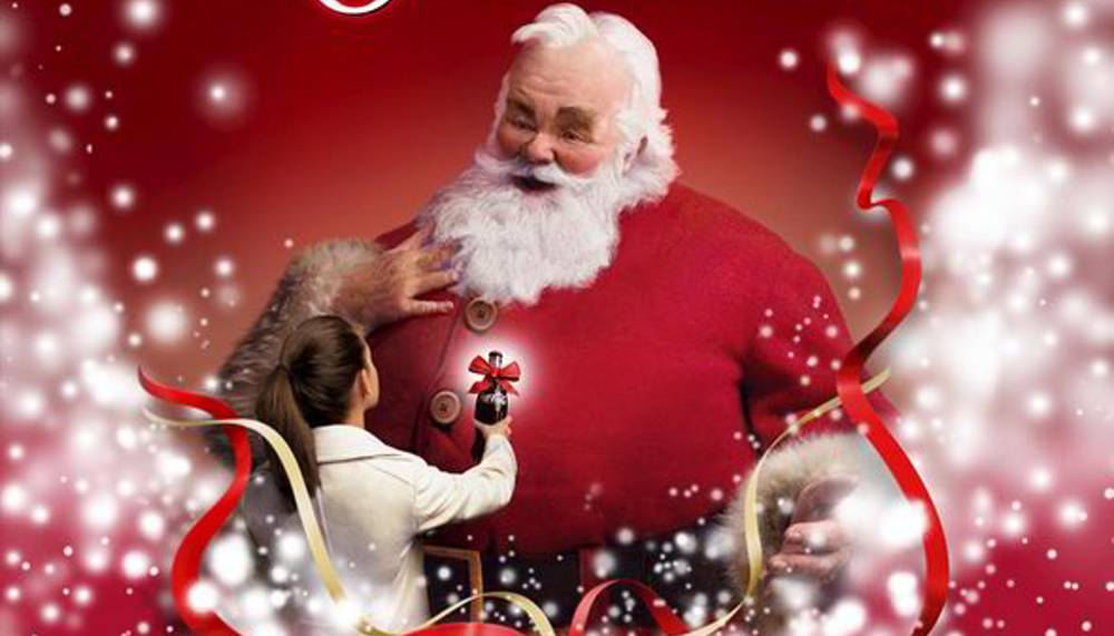 John Moore nei panni di Babbo Natale in una pubblicità Coca-Cola