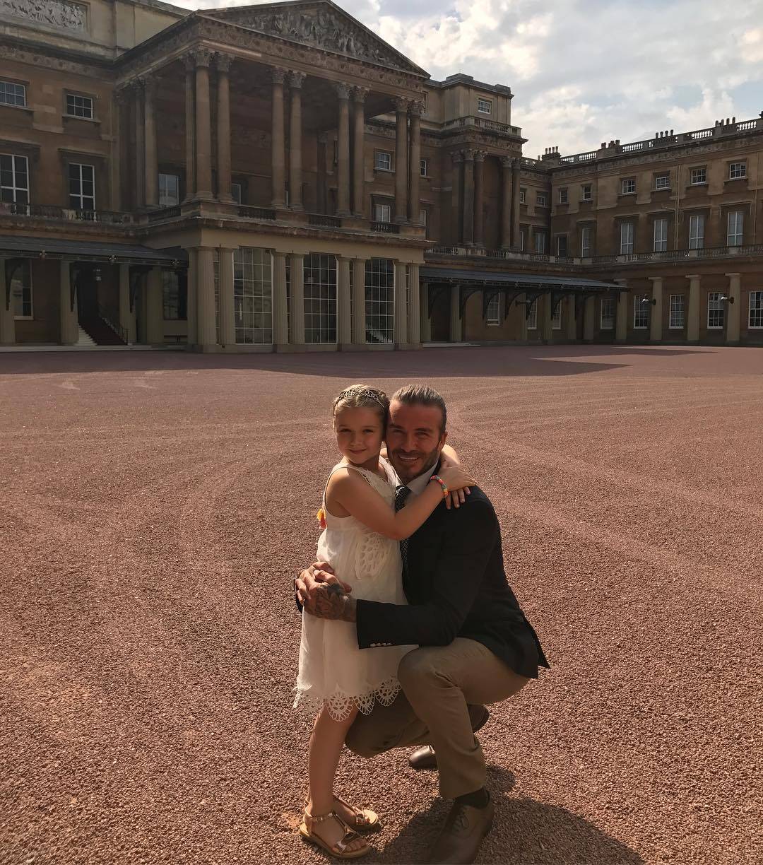 David Beckham con la figlia Harper a Buckingham Palace