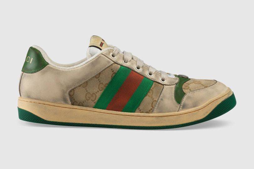 Le scarpe da ginnastica già "sporche" ​vendute a 700 euro: è l'ultima novità firmata Gucci