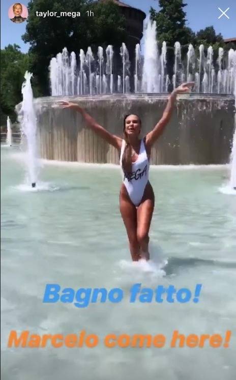 Taylor Mega senza limiti: si immerge nella fontana del castello di Milano
