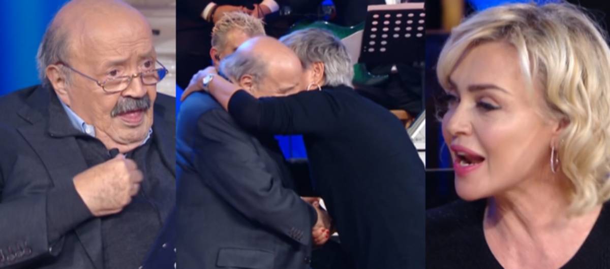 La fan irrompe sul palco e ruba un bacio a Maurizio Costanzo