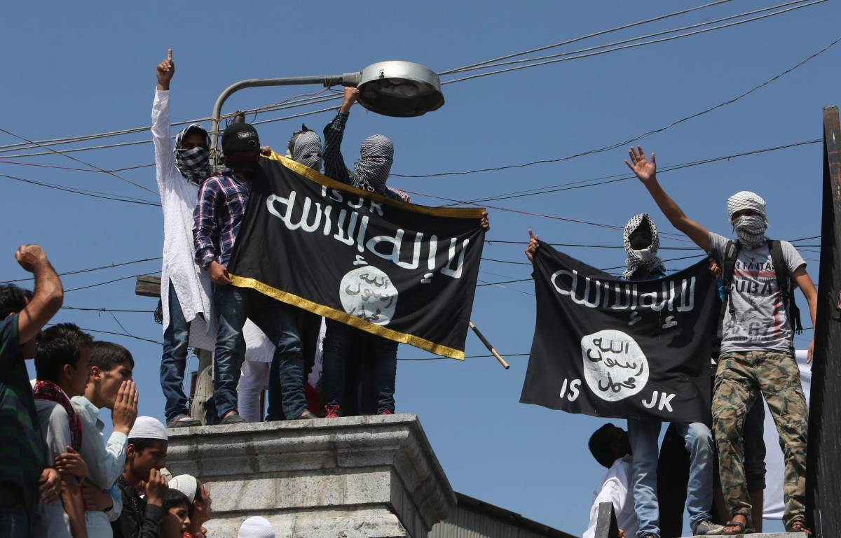 Фото на фоне флага игил. Флаг Исламского государства. Флаг запрещенной организации Исламское государство. Белый флаг ИГИЛ.