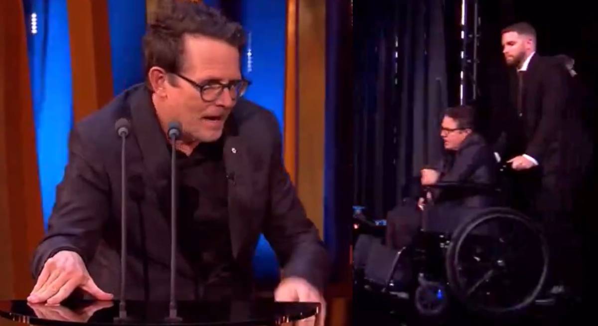 Il gesto commovente di Michael J. Fox: lascia la sedia a rotelle e sale sul podio